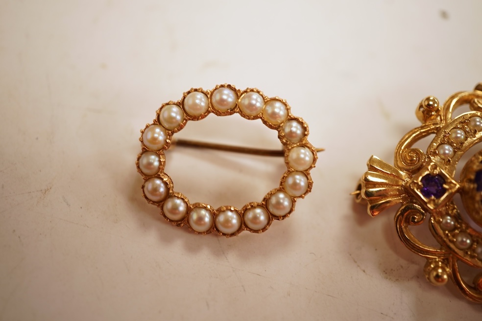 A cabochon amethyst and half pearl brooch, mounted in 9ct gold, length 3.7cm, British hallmarks, gross weight approximately 9.5 grams; and a 9ct half pearl wreath brooch, length 2.1cm, British hallmarks, gross weight 2 g
